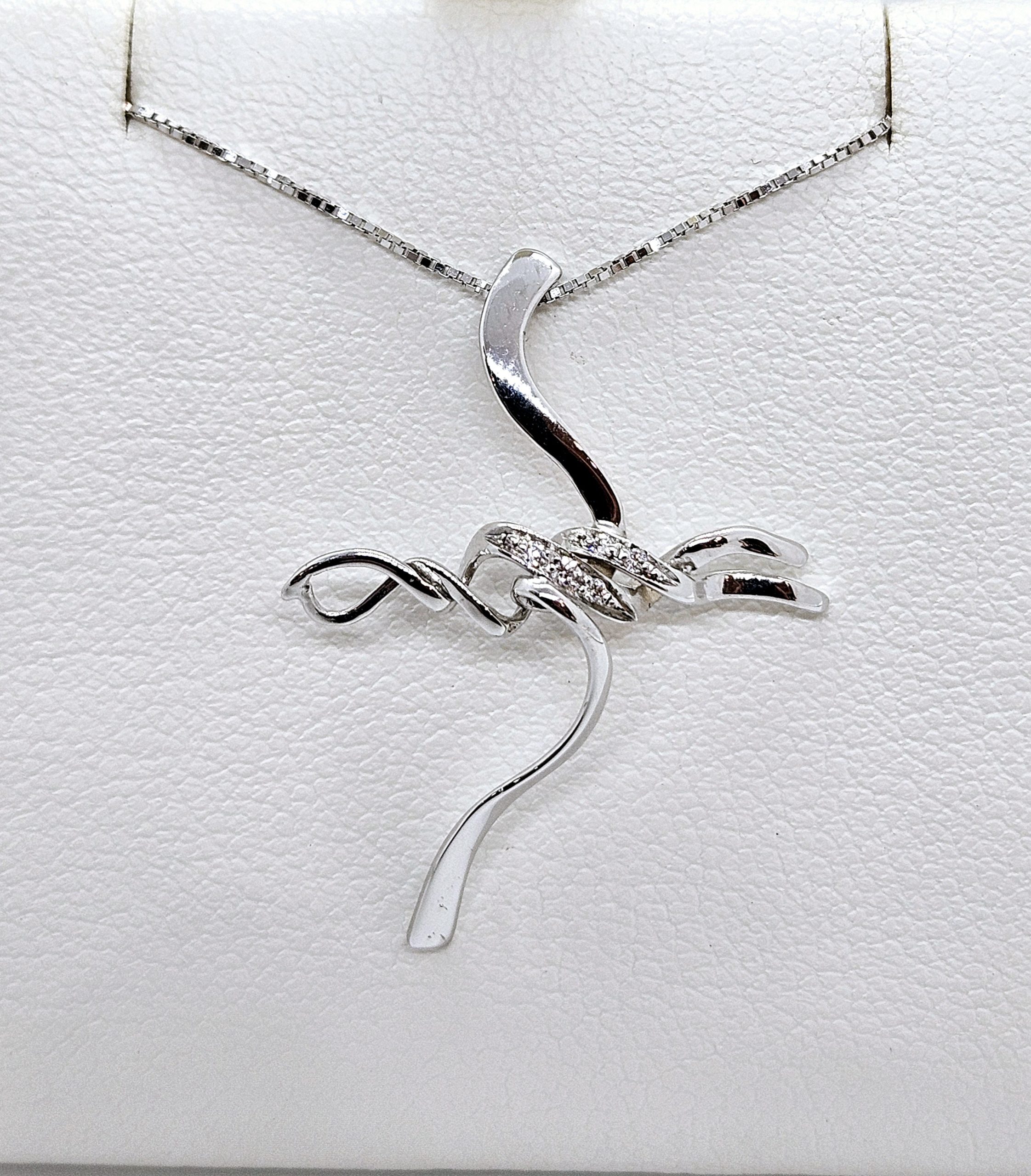 Croce con diamanti oro 18kt