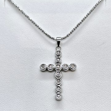 Croce in oro bianco 18kt con diamanti