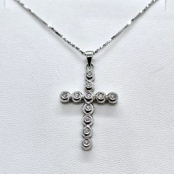 Croce in oro bianco 18kt con diamanti